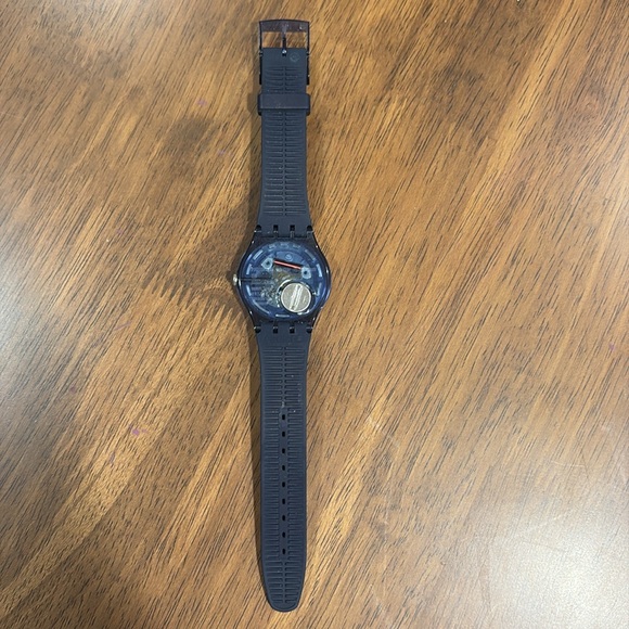 Navy Swatch Watch with navy circle sparkle on watch face. - Picture 2 of 4
